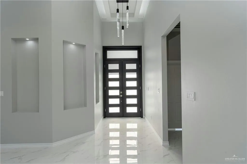 Adepec Homes — Modern Retreat Grand Entryway